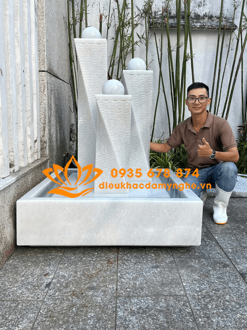 Thiết Kế Đài Phun Nước 3 Trụ Bi Xoay Bằng Đá Trắng Đẹp Nhất