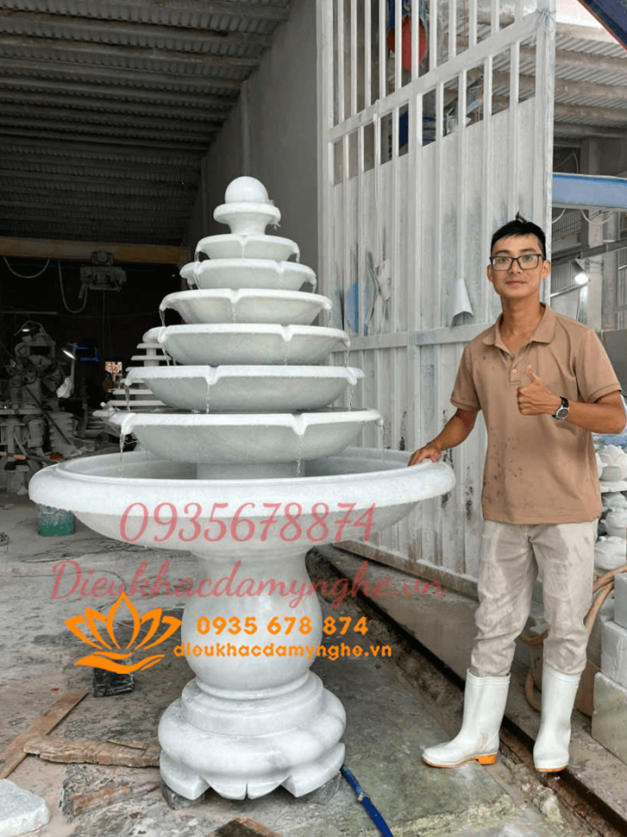 lam dai phun nuoc 7 tang size vua trang tri nha o