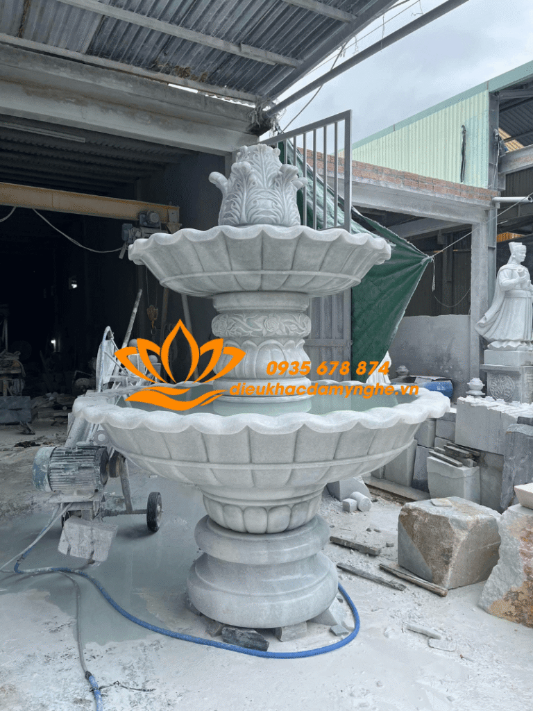 dai phun nuoc san vuon bang da dep