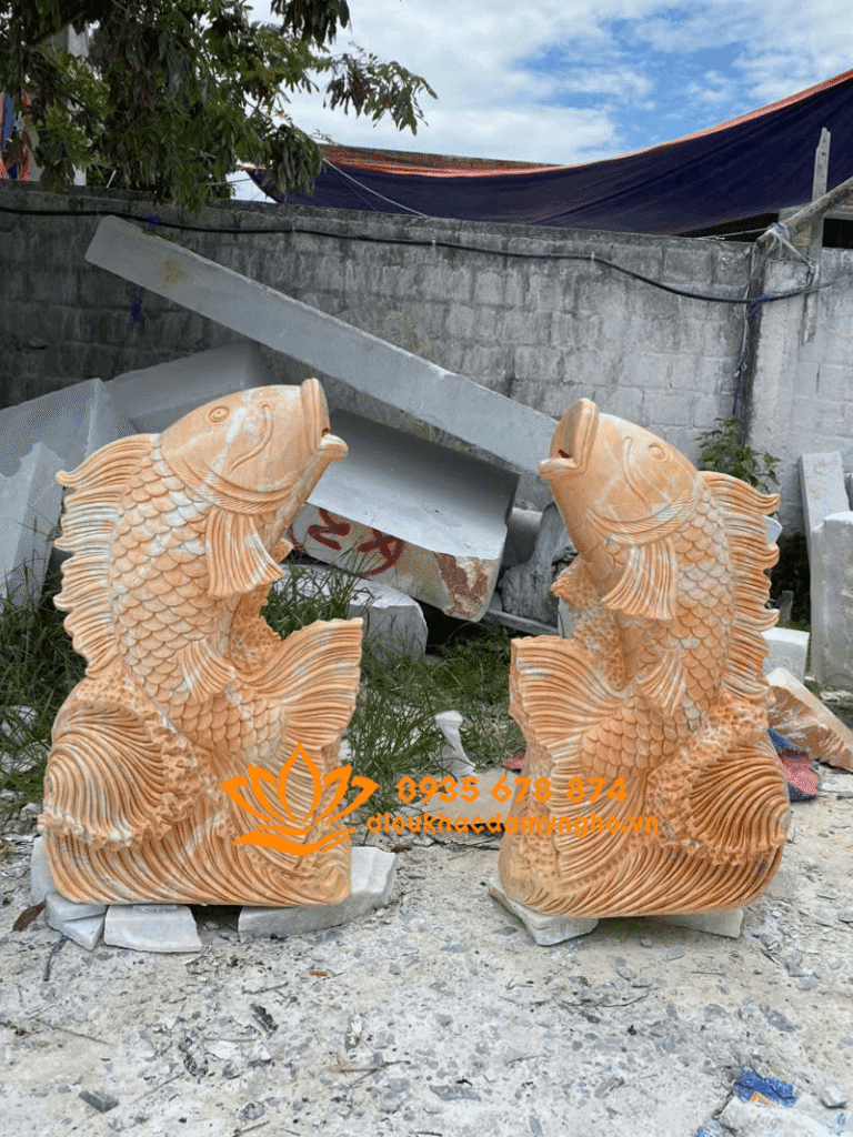 ban tuong ca chep phong thuy bang da