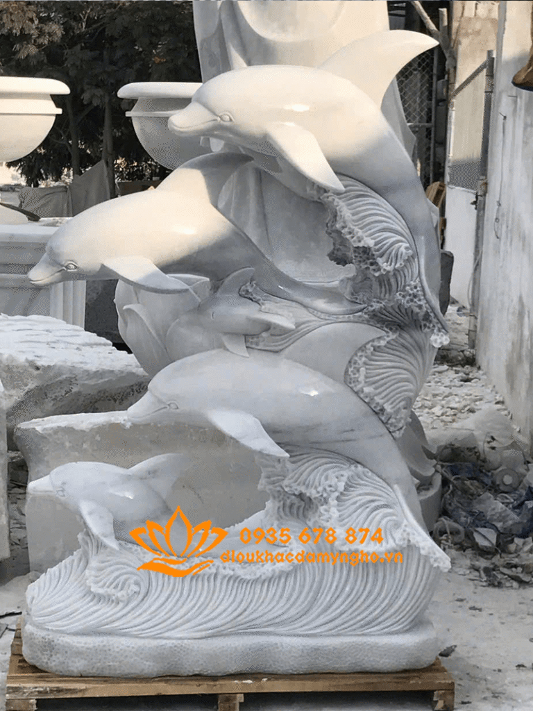 lap dat tuong ca heo phun nuoc da cam thach