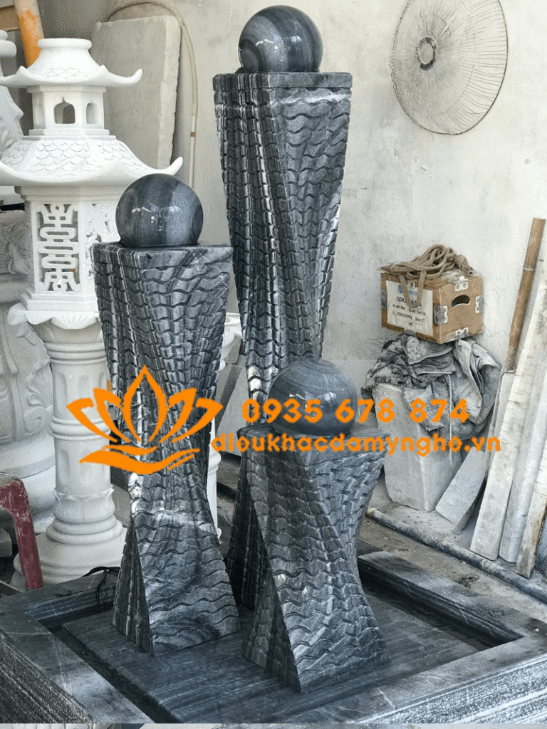 dai phun nuoc 3 tru bang da cam thach den