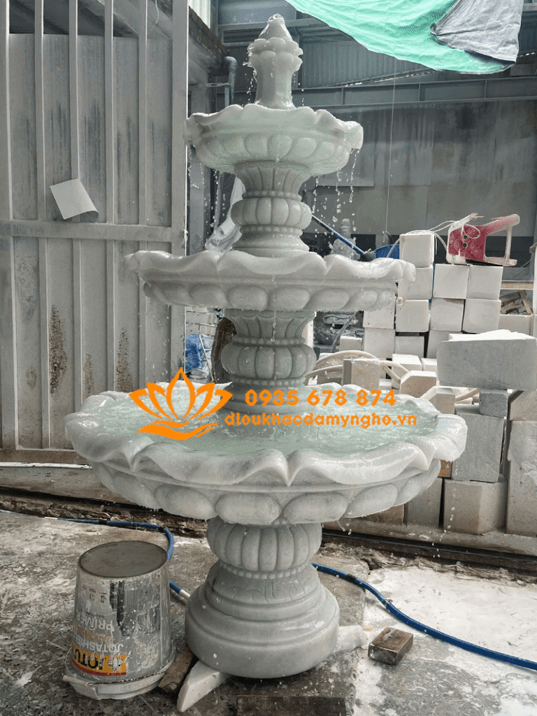 thi cong dai phun nuoc san vun bang da cam thach trang